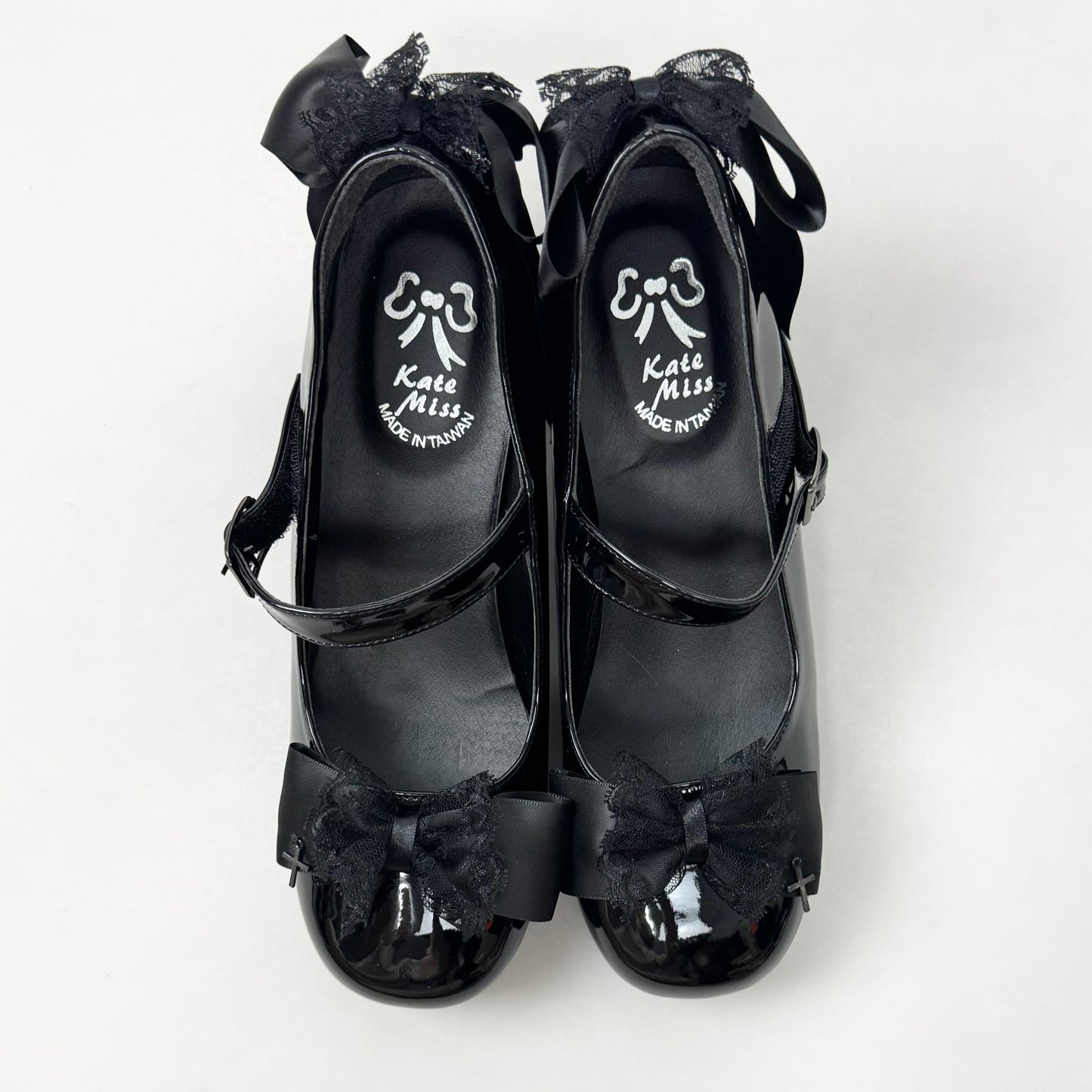 Black Bow Patent Leathe Platform Mary Janes.